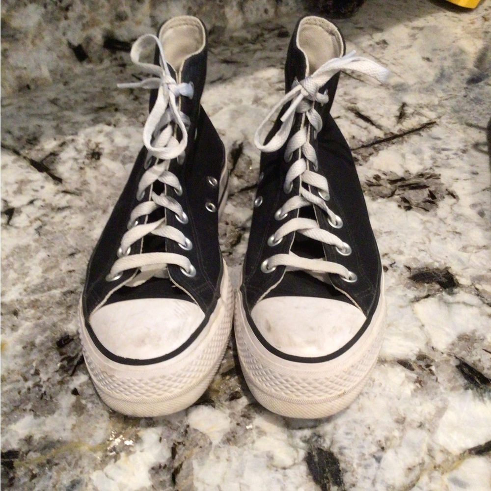 Black and white high top converse Chuck Taylor all stars . US size 6.5.